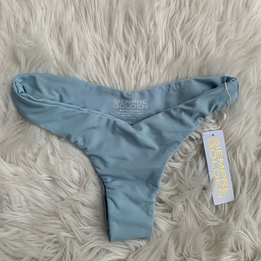 Siempre Golden cheeky bikini bottoms 🤍